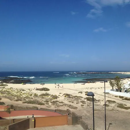 Beach One Step From The Blue Waters Of Lagoon Cotillo